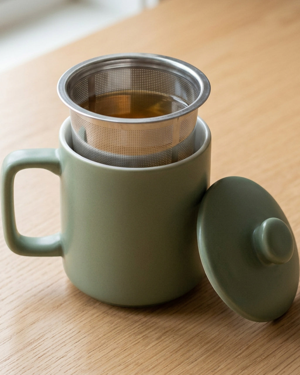 Zgmdw Alderwell Ceramic Tea Mug with Infuser and Lid 13 oz Sage - Lifestyle view