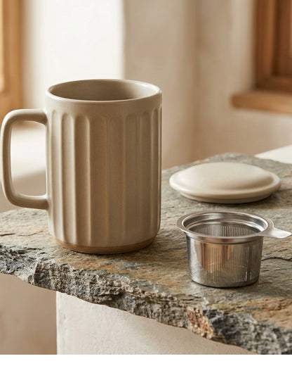 Zgmdw Ribbed Cylinder Ceramic Tea Cup with Slot Infuser and Lid 13 oz Clay Oat - Lifestyle view